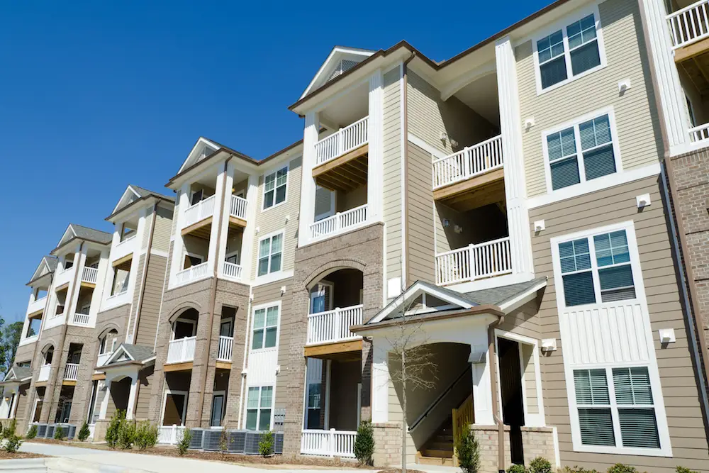 The exterior of a three-story apartment building