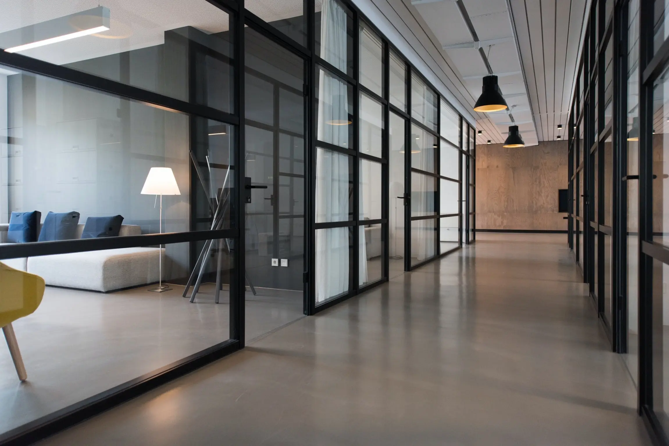 The interior corridor of a modern multi-unit building